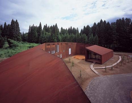 The snake-like pathway around the building and surrounding woodland is by artist Tadashi Kawamata