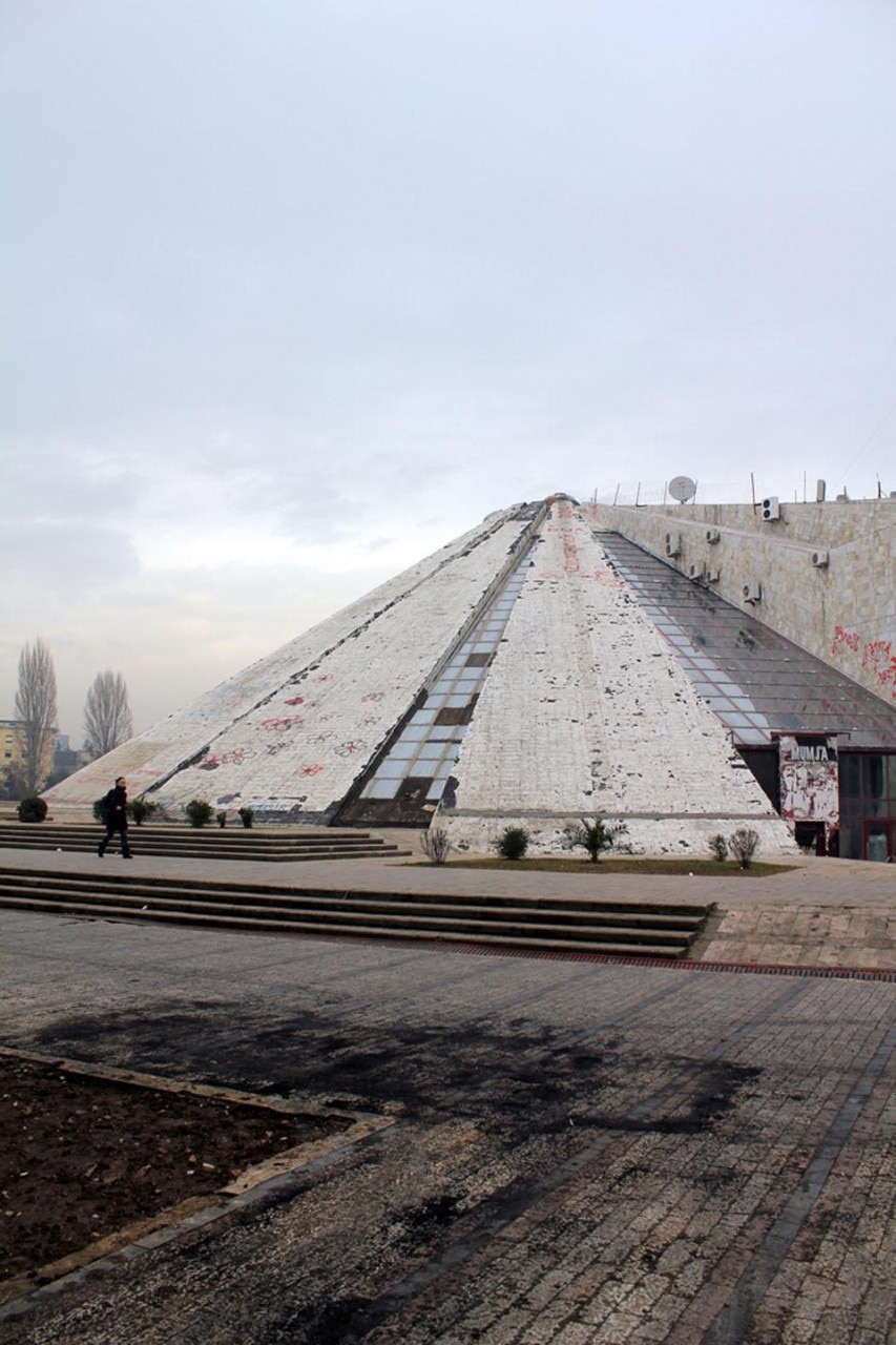 Leftover soot from vehicles, burnt during violent anti-government clashes between socialist-opposition demonstrators and police in Tirana on 21 January, is still visible in front of the pyramid. Three demonstrators died during the violent clashes. 