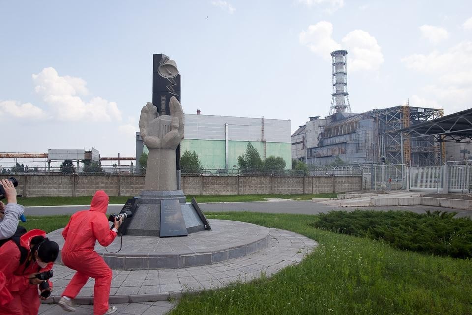 The rush to take pictures of Chernobyl's Reactor 4 sarcophagus in under two minutes. Photograph by Neil Berrett.