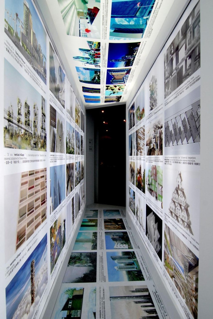 Visitors are led through a glowing tunnel, lined with images harvested from a Google image search of the term "vertical village"