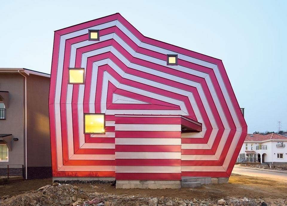 Top: In the dreamlike scene of <em>Illustrated Diary “Ring Ring”</em>, iconic figures coexist in a world free of functional and physical constraints. Above: Lollipop House (2012). In place of the usual typological repetition, Moon dialogued with the clients to make a new type of architecture with pop and erotic implications. Photo by Namgoong Sun