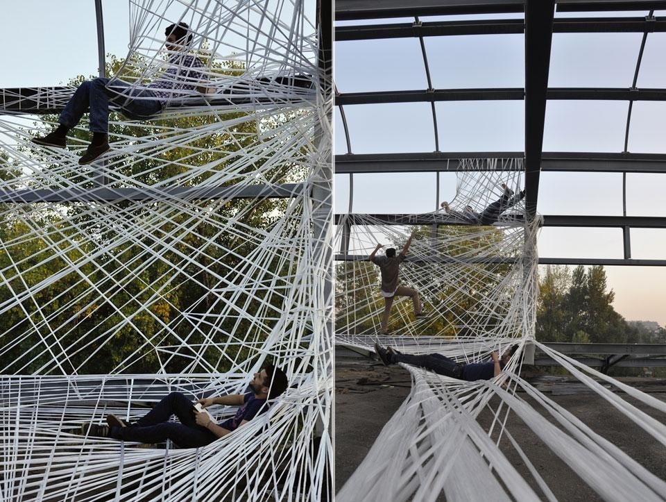 A stretched polyethylene web at Milan's unused San Cristoforo station