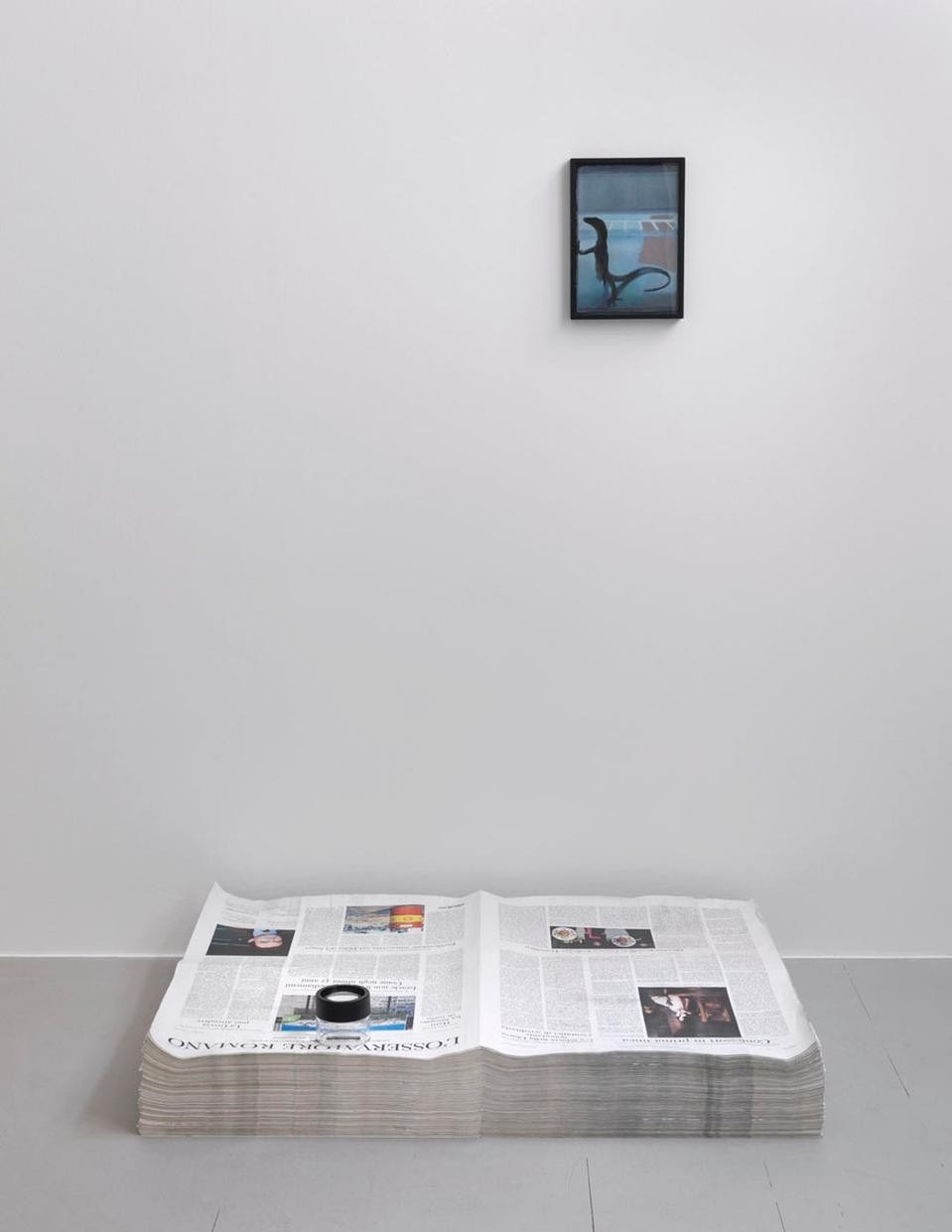 Pietro Roccasalva, <i>
(Unicuique Suum)</i>,  
2010. Stacked newspapers, magnifying glass, acrylic on paper.
