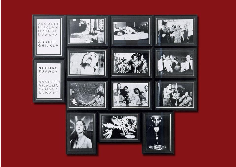 Renée Green, <i>Between and Including, Set A (Akerman to Bogeyman),</i> 1998. Black-and-white framed photographs, framed texts and painted wall. 14 panels, dimensions variable; 10 panels, 6 1/2 x 8 7/8 in. each; 4 panels, 8 7/8 x 6 1/2 in. (22.5 x 16.5 cm) each. Rubell Family Collection, Miami