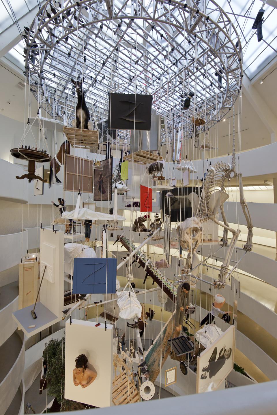 Installation view of the exhibition <i>Maurizio Cattelan: All</i> at the Solomon R. Guggenheim Museum. Photo David Heald © Solomon R. Guggenheim Foundation.