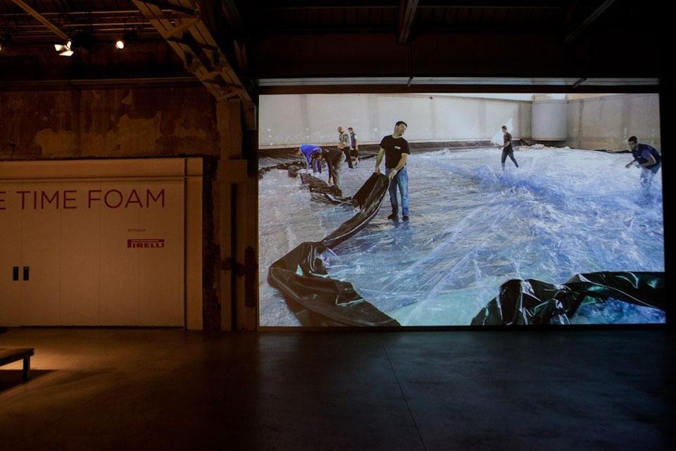 A view of the projections during the event, showcasing the installation of Saraceno's piece at Hangar Bicocca