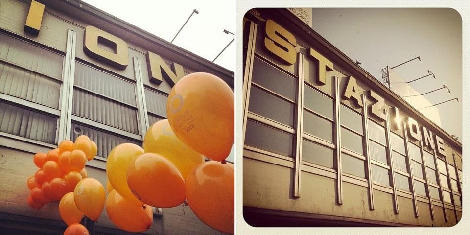 Top: Bologna's via dell'Indipendenza bus station, where the SetUp art fair took place. Above: The entrance to the bus station was marked by a few orange balloons