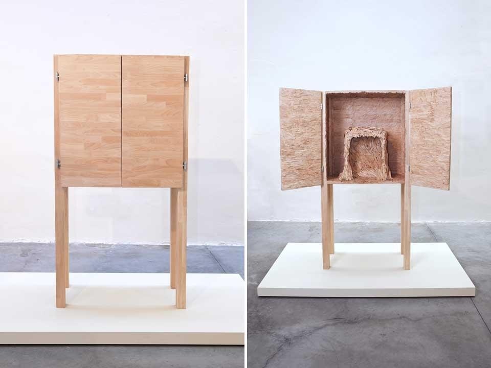 Adrien Petrucci, <em>Reformed Objects</em> for Dilmos. Four wooden sculptures which include a ladder with a hat-shade, a clock-box and a desk with seat in bare wood recomposed in a new form