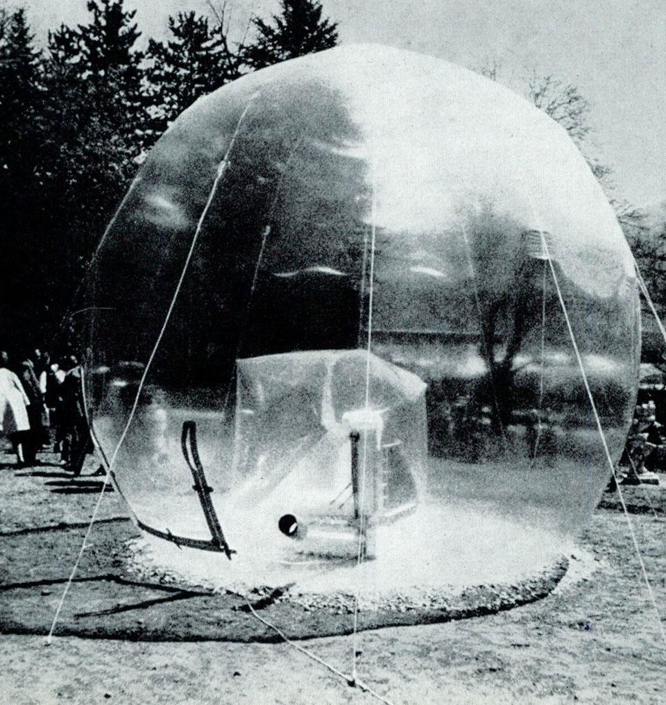By Walter Pichler, architect and designer in Vienna, a transparent inflatable sculpture (<i>Grosser Raum</i>, 1966) shown in a transparent sphere, in Kapfenberg Park, Austria, in the spring.