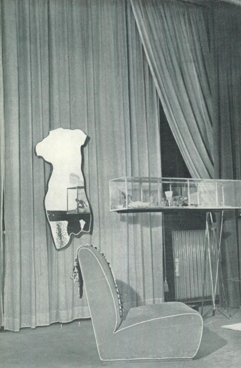The 'Venus' mirror,  lounge chair and window.
