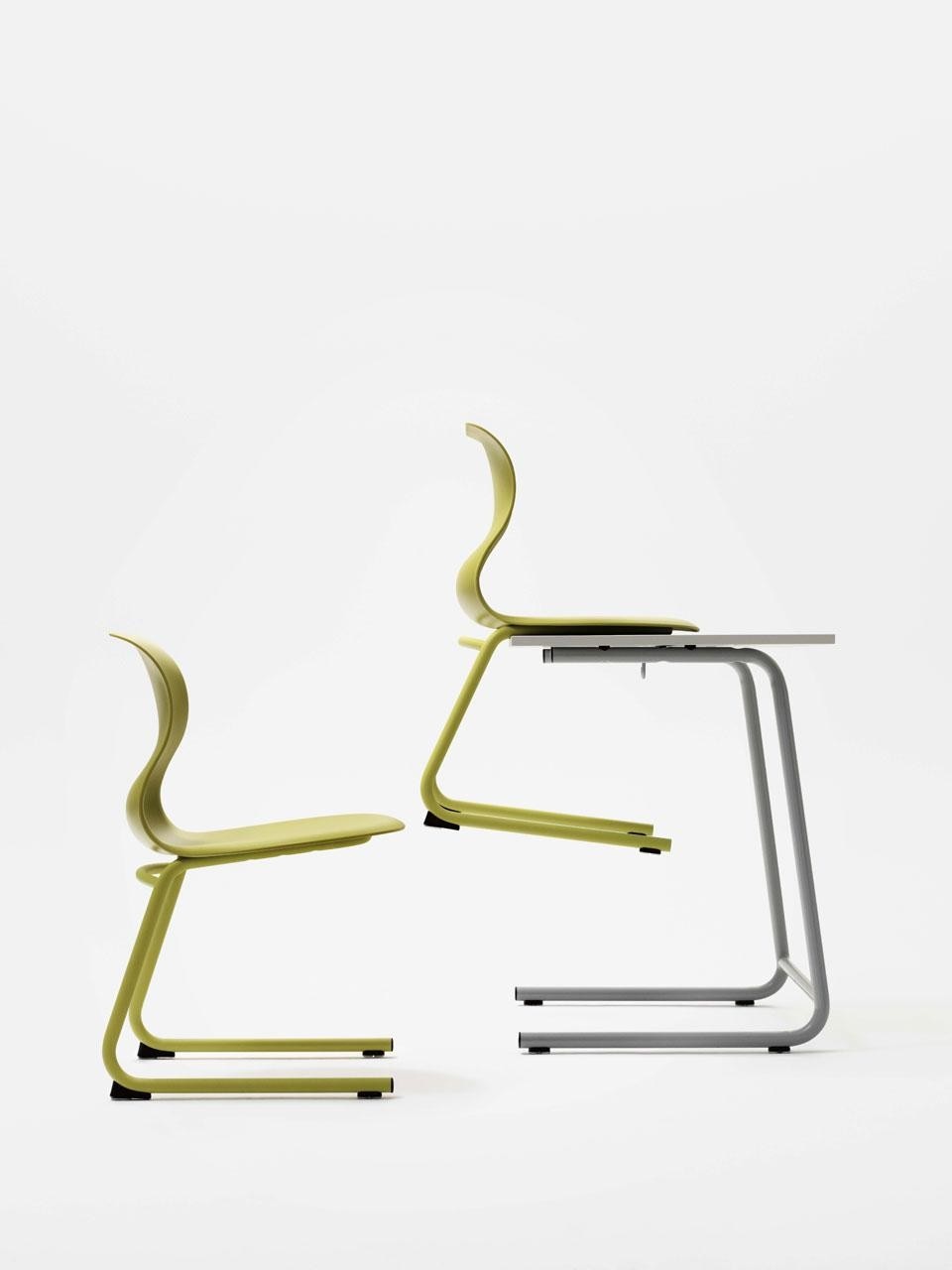 The support structure is made of tubular steel, formed as a C with four legs. Grcic has also designed additional accessories such as cushions for the seat, connecting elements, and trays.
