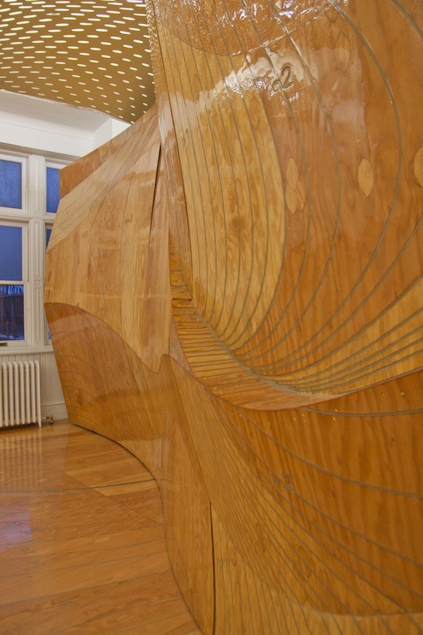 The panel geometry emphasizes movement and journey by using topography as a response to the program.
