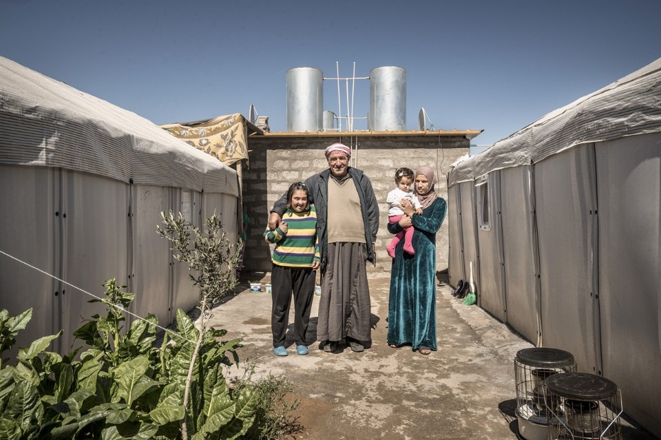 Hussein with daughters and grand daughter, Kawergosk Refugee Camp, Erbil, Iraq March 2015. Photo © Better Shelter