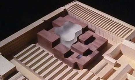 The building complex is developed around a central courtyard with a curious flower like or amoeba shape