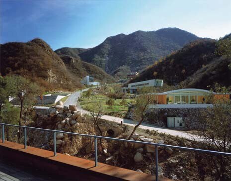 <b>Masterplan</b>. Twelve architects have been recruited to design the first group of houses on the site, alongside a club house that will provide hotel facilities for residents and guests. Visible here above, from the left, designs by Rocco Yim, Antonio Ochoa, Cui Kai and Shigeru Ban 
