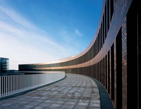 A local dark engineering brick is used for contextual reasons. This also provides an evenness of form