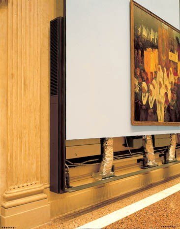 An ingeniously engineered mechanical device allows the new exhibition walls to slide upwards to accommodate even very large works