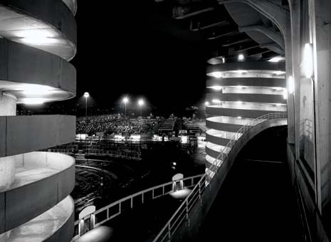 The open parking lots at San Siro, seen from one of the access ramps to the various stadium rings, now the subject of a planning study by Stefano Boeri