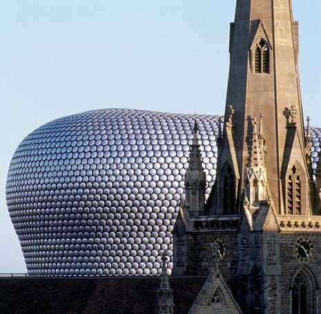 In spite of its unconventional form, Selfridges provides a surprisingly sympathetic setting for its gothic neighbour. The really abrupt contrast is with the rest of the shopping centre of which it forms part