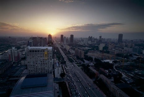 The main east west route in the city is the Jianguomennei Daji, intersecting with the north south axis at Tiananmen Square. It is rapidly turning into a one building thick version of the Las Vegas strip, crowded with attention-seeking development