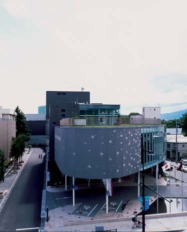 The restaurant, located at the western end of the building, floats above the entrance and drop-off point