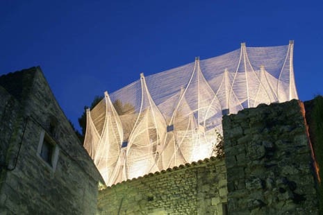Lower Terrace from below, with medieval fortifications. Photo courtesy nARCHITECTS
