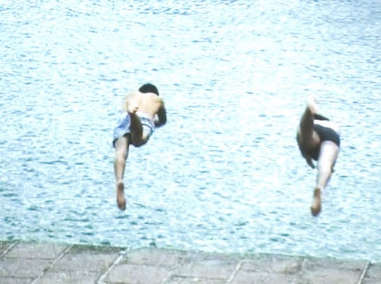 <i>The Lake Arches</i>, 2007. 
The film, described as a“portrait with ruins“, narrates a collision taking place against the backdrop of a post-modern housing project (made to look like a water-locked dungeon) designed by Ricardo Bofill in Saint-Quentin-en-Yvelines. Courtesy Cosmic Galerie (Bugada & Cargnel), Paris