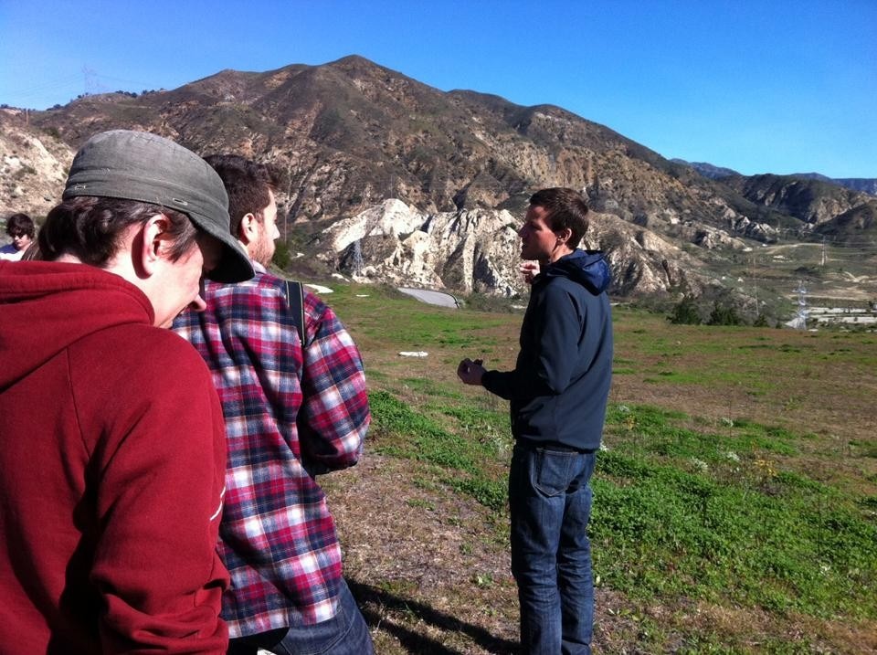 Geoff Manaugh leads Landscape Futures Super-Workshop students around a housing division near the Cascades, where freshwater is piped into the San Fernando Valley, taken from hundreds of miles away. The students were later to realize that the landscape around them was actually the remains of an abandoned golf course. Photo Jamie Kruse