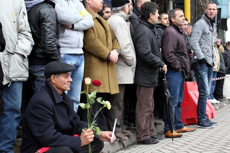 Spectators wait for the march to pass along Tirana’s main boulevard. 