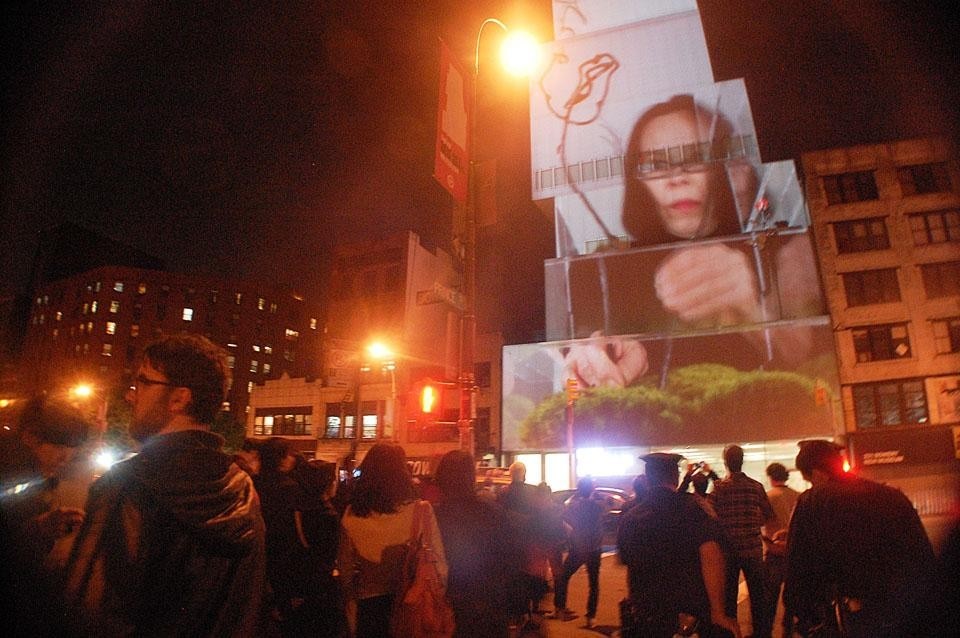 Let Us Make Cake, a collaborative projection on to the facade of the New Museum during Festival of Ideas for the New City. Photograph by Maria Gotay.