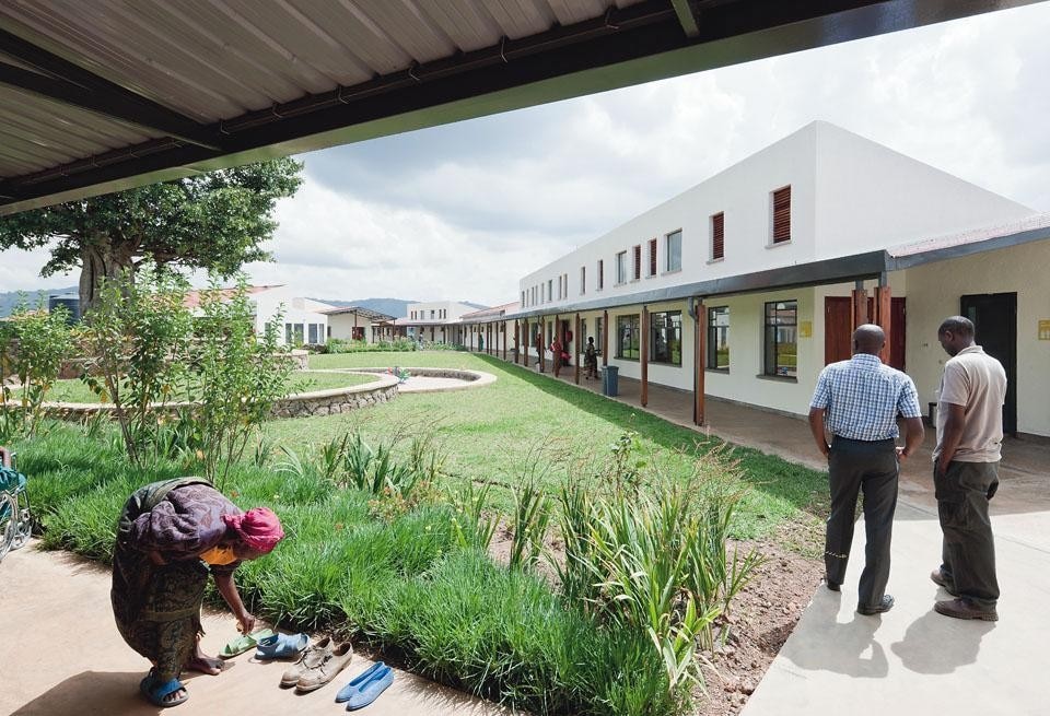 The health center has more the feel of a resort than a hospital, anonymous and isolated.