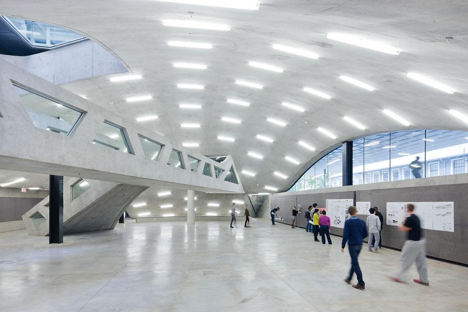 The dome space is crossed by a grid-structured concrete bridge, with a free span of more than 20 metres.