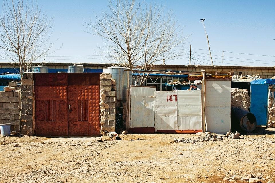 In the IDP camp at Ma’asker
Salam, the front gates
of some houses were once the
doors of the Army’s stables