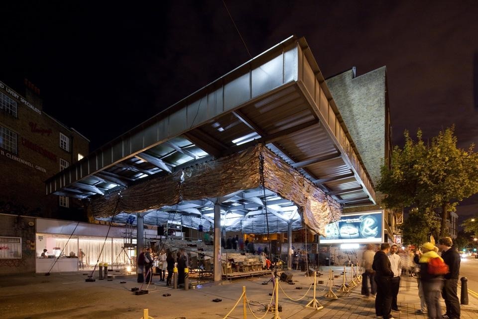 The <em>Cineroleum</em>, a derelict
petrol station on Clerkenwell
Road transformed by
Assemble into a hand-built
cinema celebrating the
extravagance and ceremony
of the picture palace