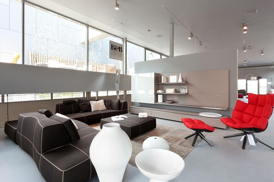 The B&B Italia area: the <em>Bend Sofa</em> designed by Patricia Urquiola; <em>Husk</em> chair designed by Patricia Urquiola; and <em>Pab</em> living-room system designed by Studio Kairos. Photo by M. Lucat