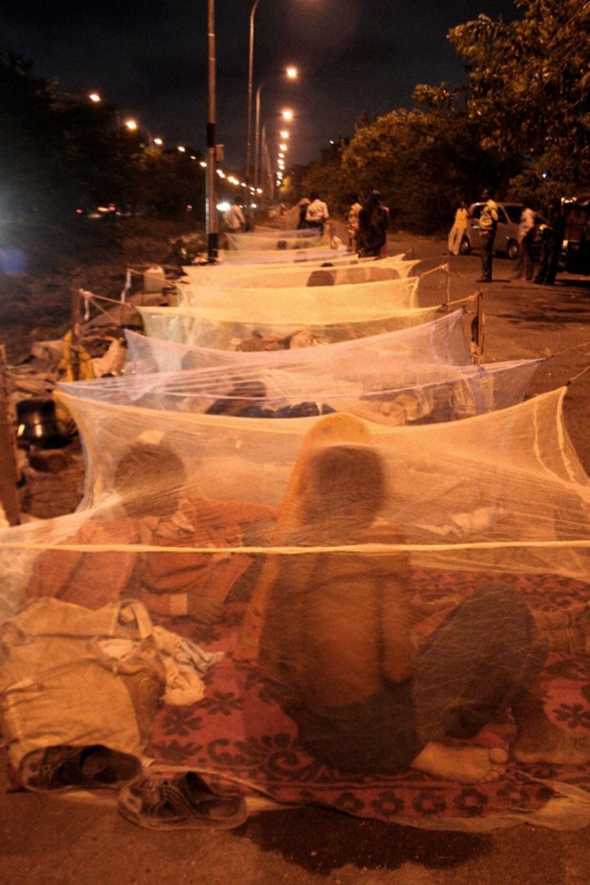 Mosquito nets colony established by migrant construction workers. Photo by Mitul Desai