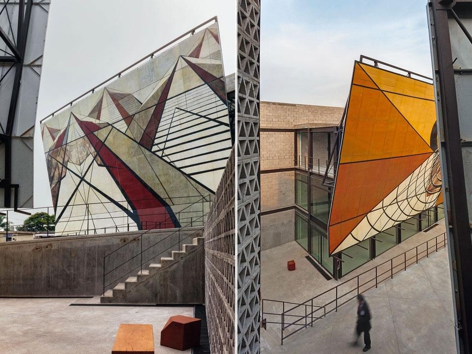 Besides providing a visual
link to the square, the
murals mark the volume
that houses the cafeteria on
the right and, on the left, the
archives and library block Besides providing a visual
link to the square, the
murals mark the volume
that houses the cafeteria on
the right and, on the left, the
archives and library block