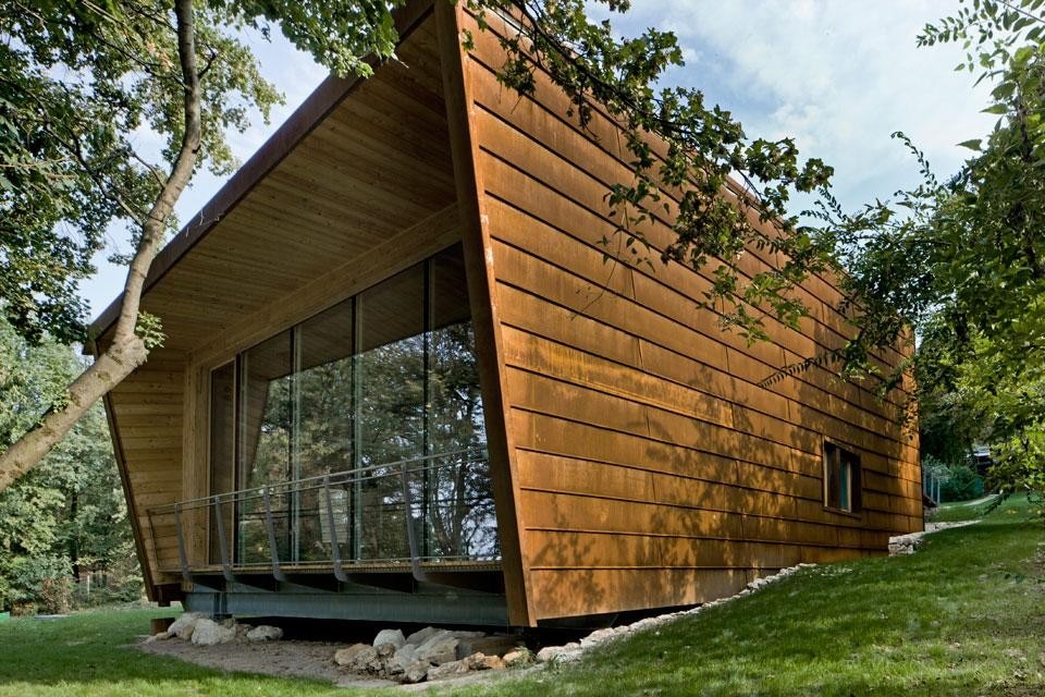 The south elevation overlooks a steep slope The south elevation overlooks a steep slope