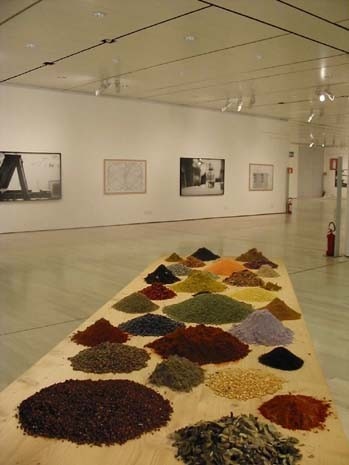 A long table laid with spices evokes the odours of the American composer’s culinary art