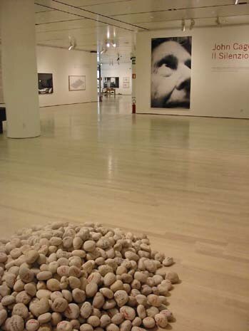 A small “garden” of stones, collected from different parts of the world, was situated near the telephone table of the loft