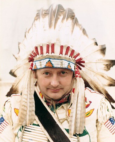 The German romance with American Indians is recorded in several color shots by the photographic team of Andrea Robbins and Max Becher, “Chief” (1997-98). These Nordic types do not present tribal visages, but their dress and demeanor is very sincere
