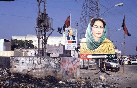 Billboard announcing the exhibition staged in some gas stations, in Karachi