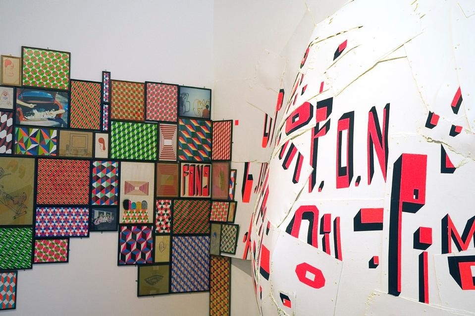 Barry McGee, Installation view:
Drawing Bump, 2009,
framed drawings ink on paper. Tagger, 2005, lifesize animatronic figure. Courtesy Deitch Projects, New York
