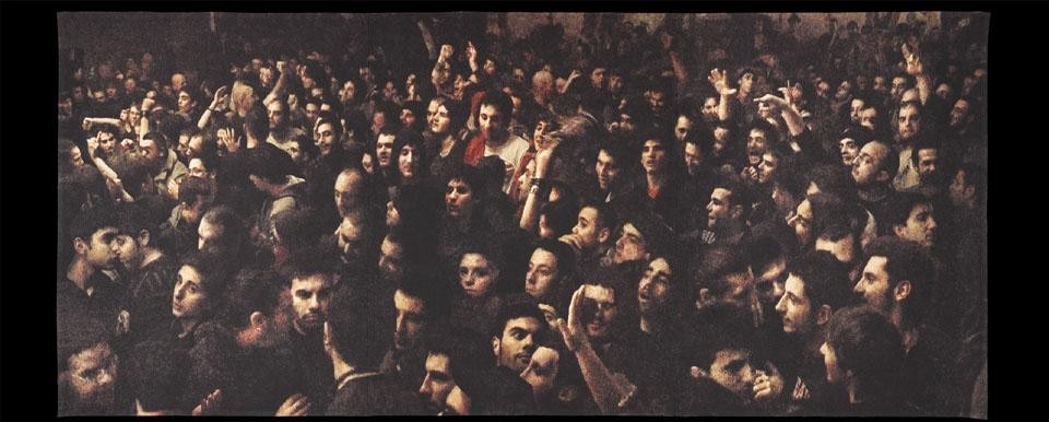 Craigie Horsfield, <i>At 99 Posse Concert. Via Gianturco, Naples. September 2008,</i> 2010. 375x855cm, wool and cotton, woven by Flanders Tapestries Lent by the artist.
