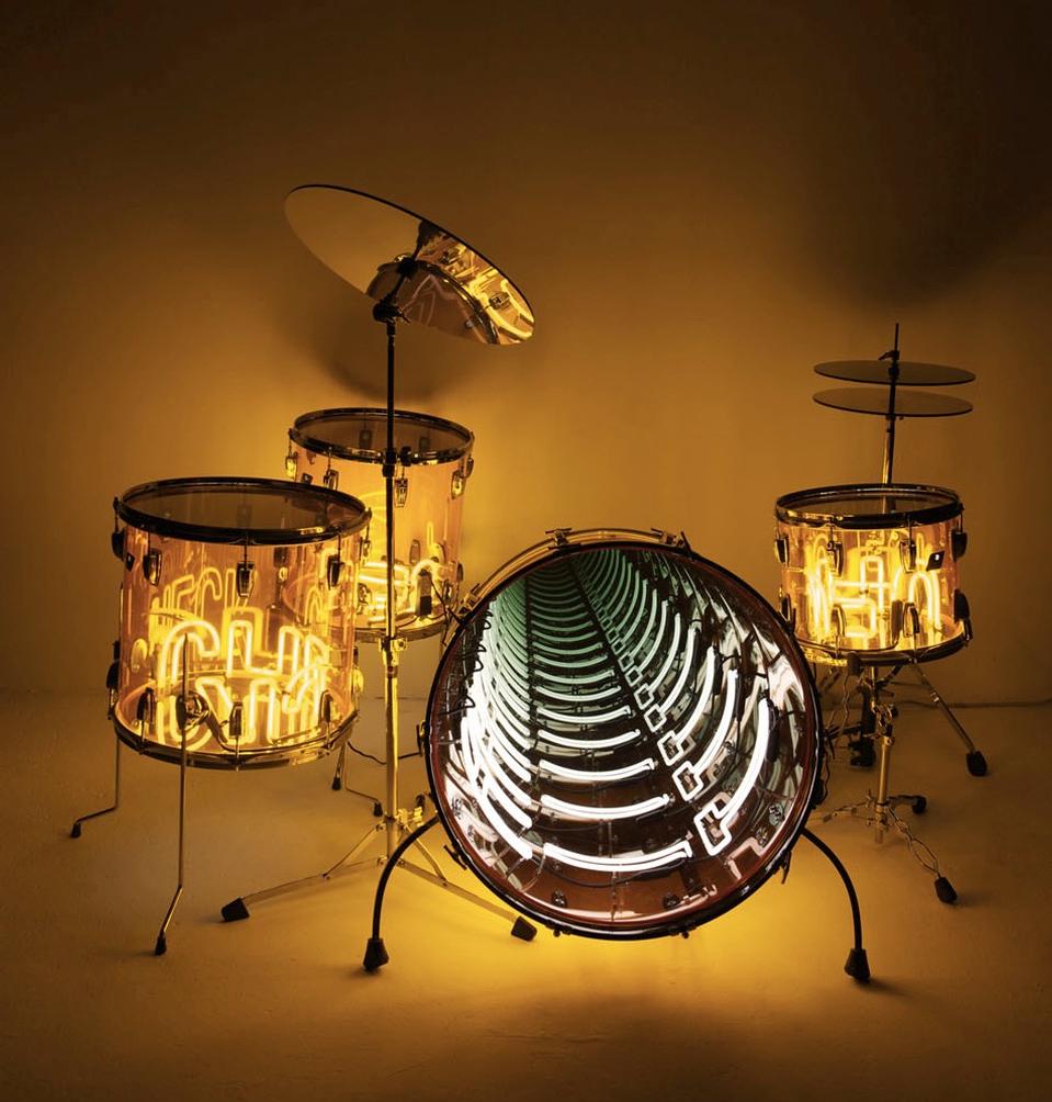 Ivan Navarro, <i>Wail,</i> 2010. Variable dimensions, installation. Neon light, plexiglass drums, metal, mirror, one-way mirror and electric energy. 

