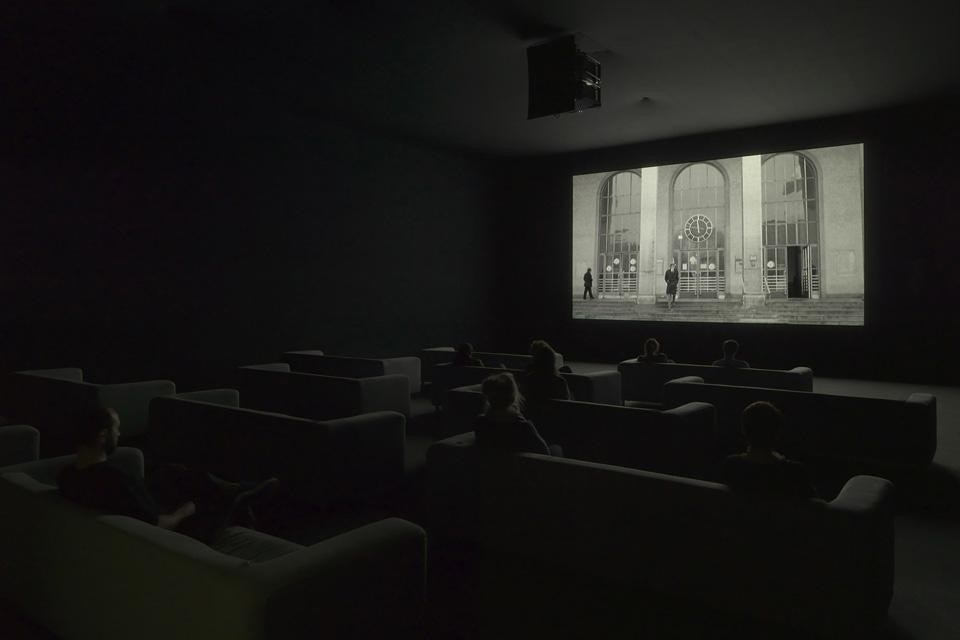 Christian Marclay, installation view of <em>The Clock</em>, 2010. Single-channel video with sound, 24 hours. © Christian Marclay, courtesy Paula Cooper Gallery, New York and White Cube, London