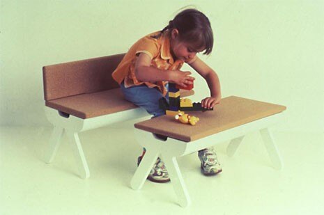Hob-nob small table with removable cork seats, revealing a space to store tojs or hide secret things