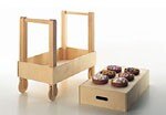 Amaretti, design Jane Atfield. Trolley which can be used as a cart, baby-bed or for storage
