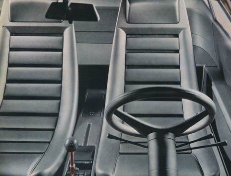 The interior completely filmed with dark grey ABS. Photo Domus 473/69