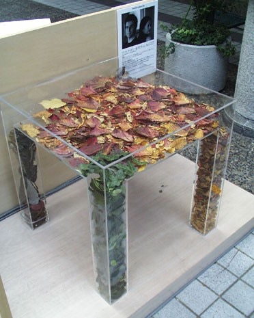 “Trans-Table” in clear acrylic to be filled with autumn leaves or other seasonal mood-indicators of one’s choice, by Gueydan & Kaneko
